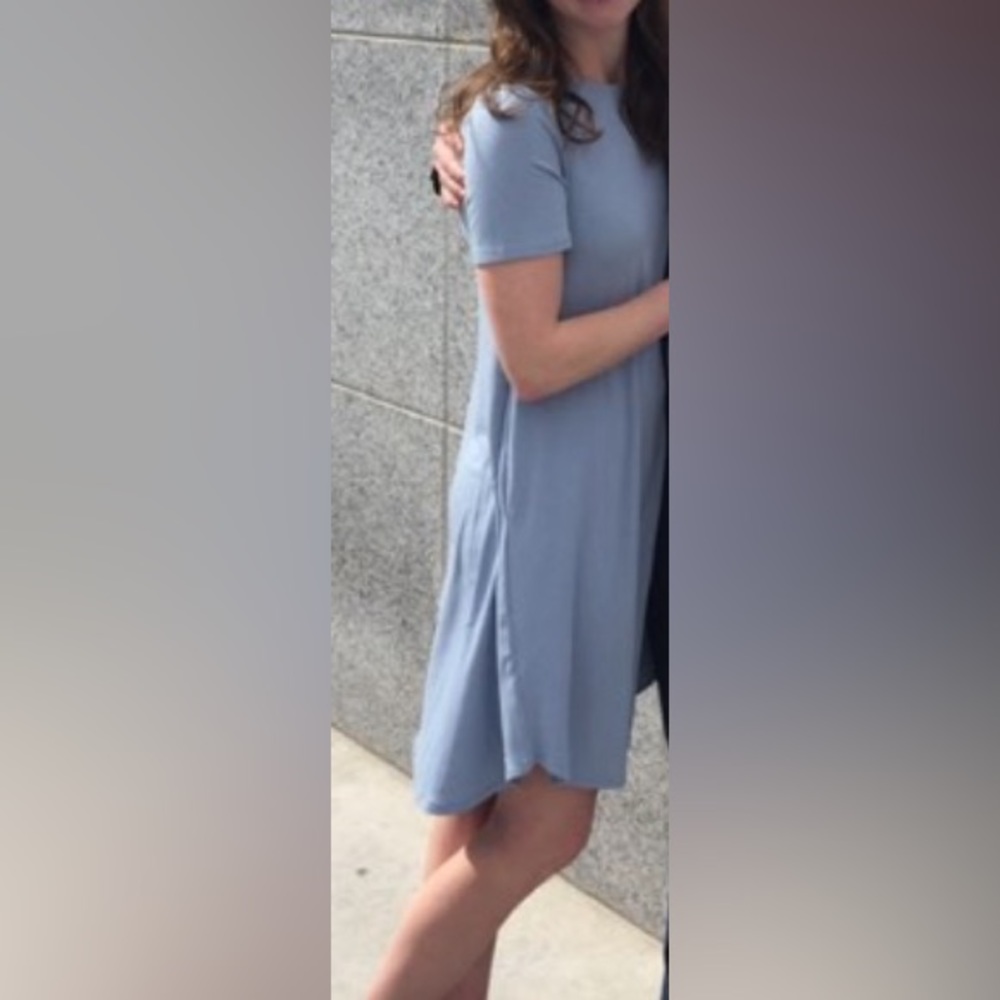 Cute women’s small high low dress with pockets!